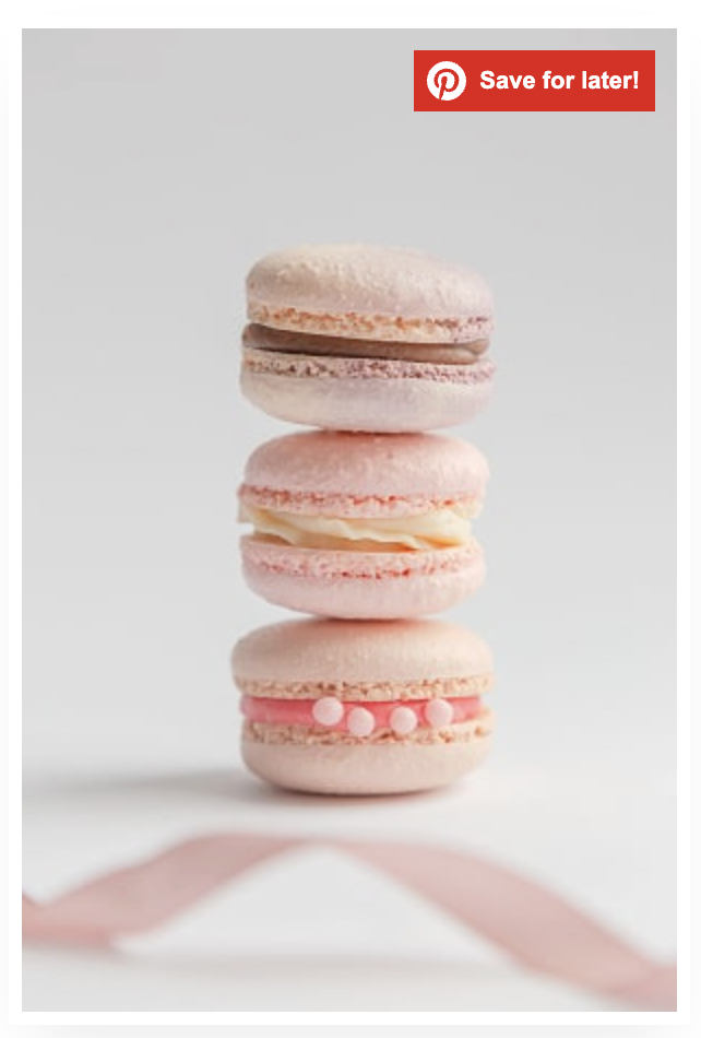 An image of macaroons with a pink Tasty Pins Pinterest Save button over it