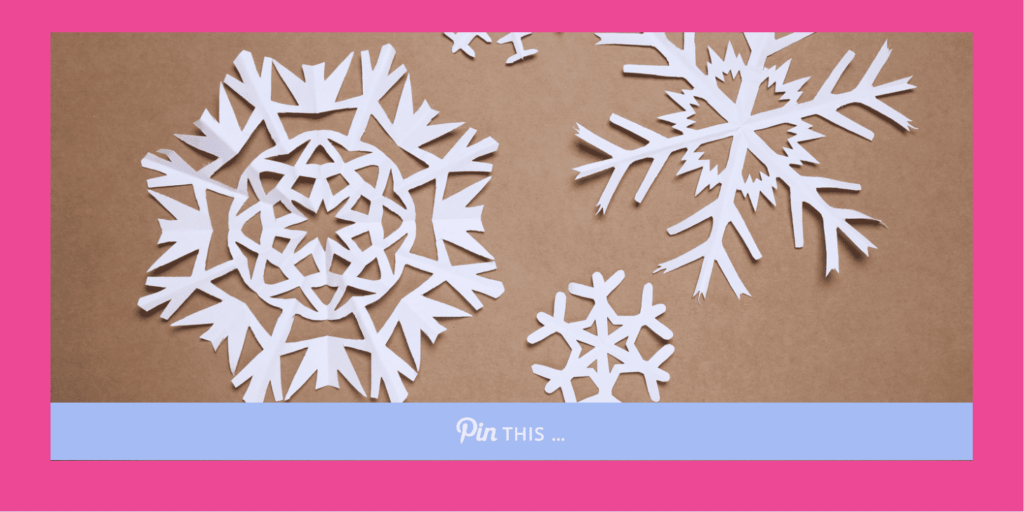 A light purple "Pin this" banner on a DIY horizontal hero image with cut out snowflakes